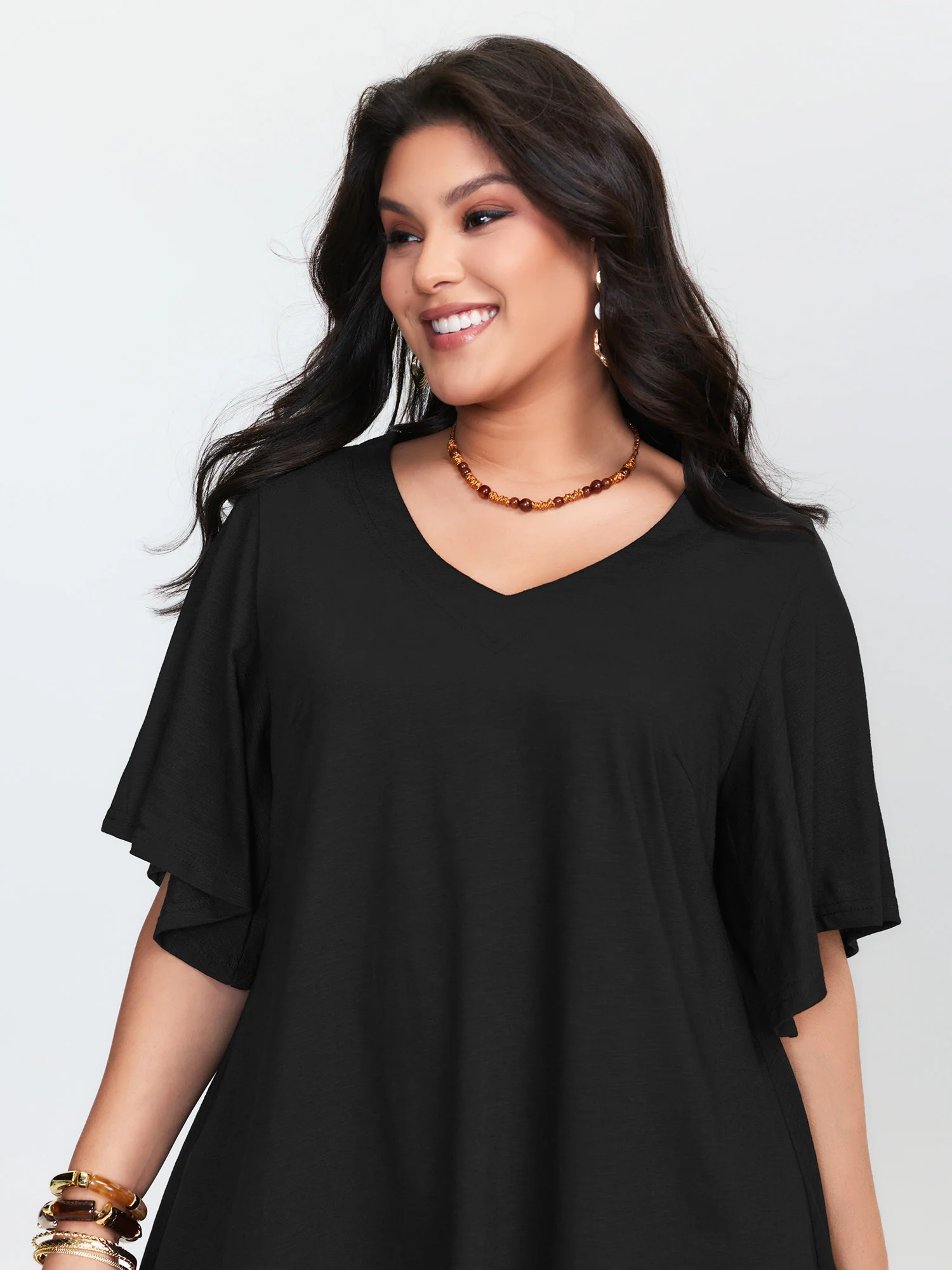 Asymmetrical Tassel Hem Plain Tunic - Image 3