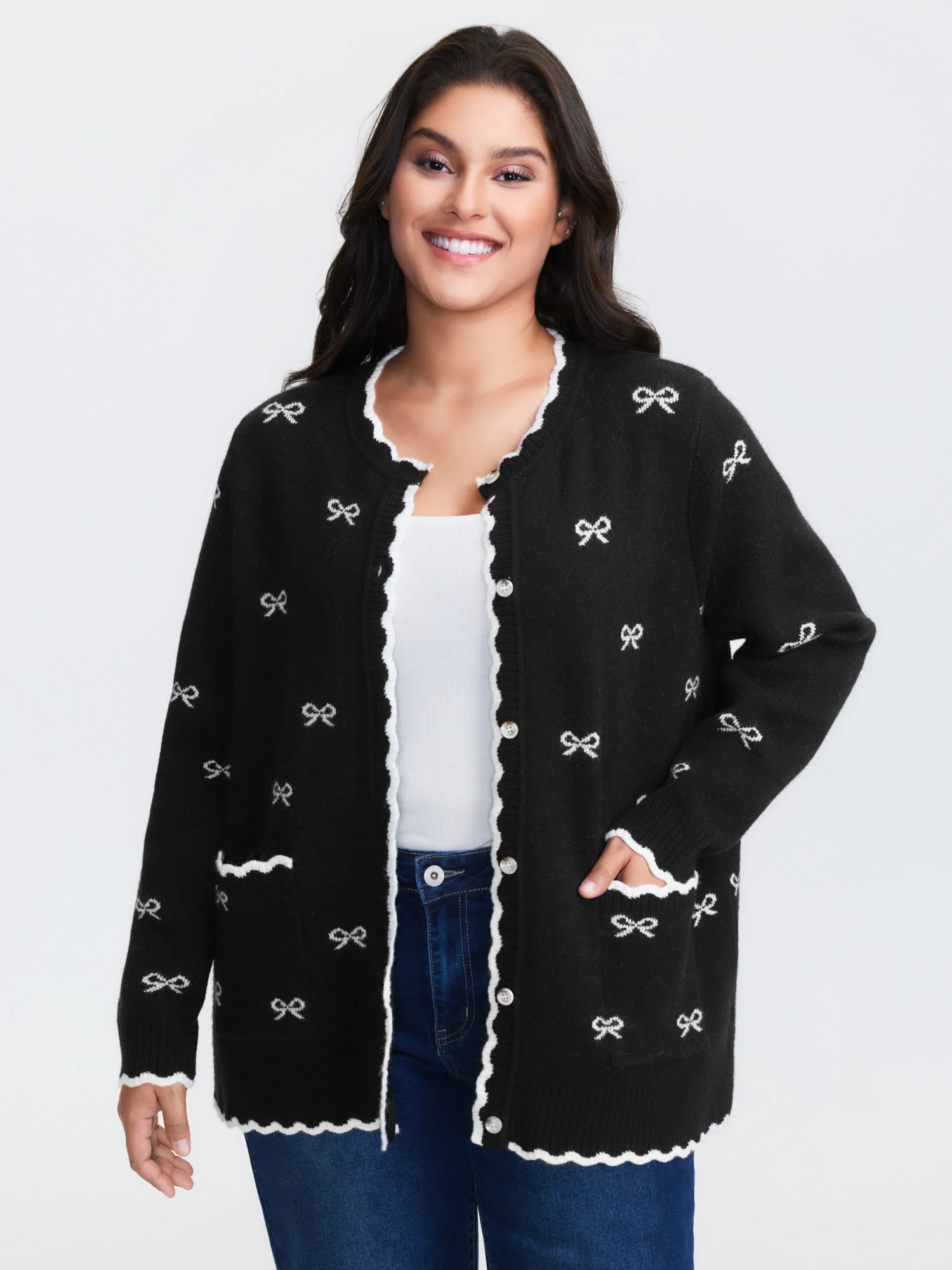 Bowknot Jacquard Wavy Edge Knit Cardigan