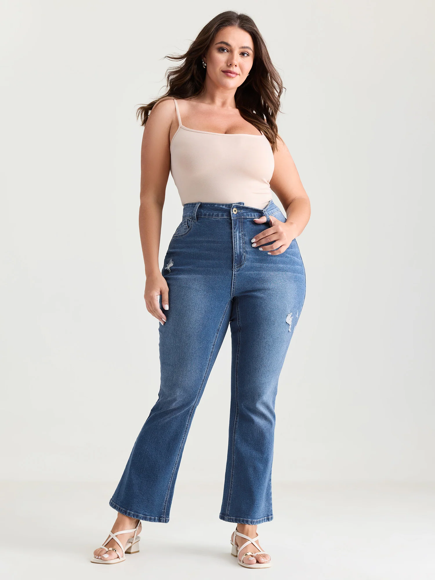 Thigh-Friendly Washed And Distressed Flare Jeans